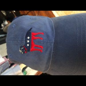 blue hat with red white and blue dog